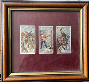 FRAMED DISPLAY OF THREE CIGARRETTE CARDS ON ANGLO-ZULU WAR THEMES