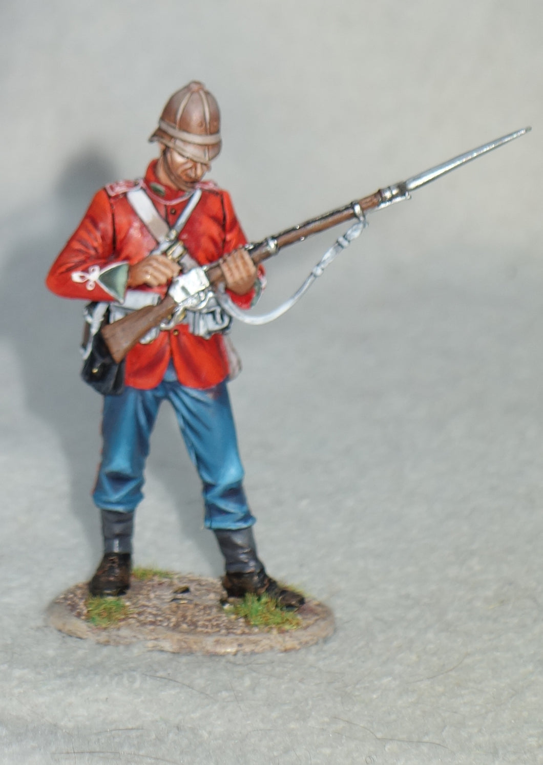 First Legion Anglo-Zulu War Painted Figure - Private, 24th Regiment, standing loading Martini-Henry rifle.